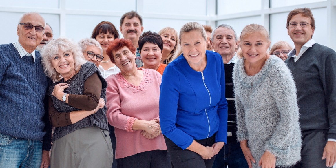 Portrait Of Senior Friends Hiking In Countryside