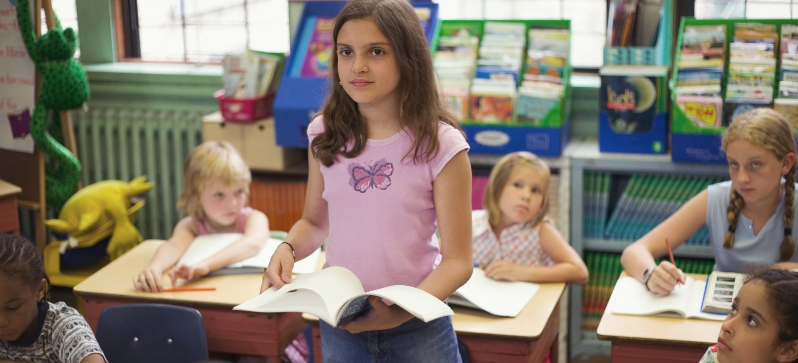 girl-standing-in-classroom-2109572.jpg